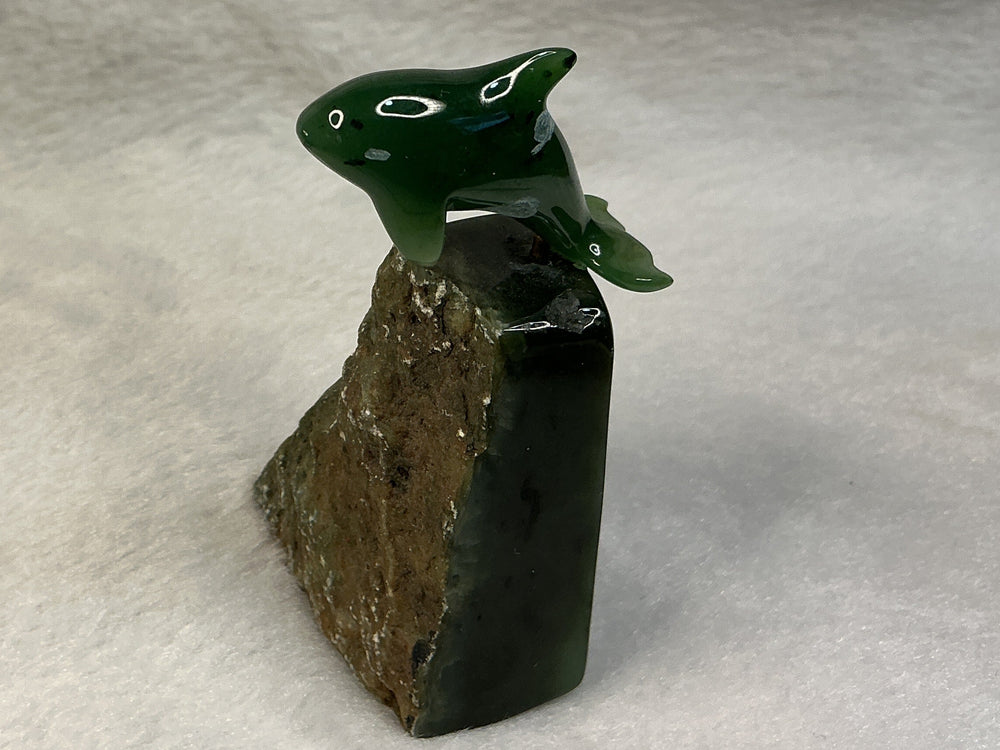 Jade orca on jade base