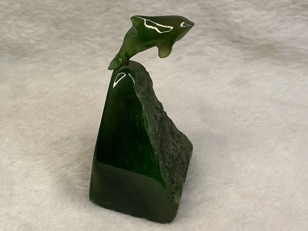 Jade orca on jade base